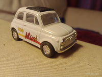 Kintoy Fiat 500 Mini diecast model car. a diecast model of a Fiat 500
